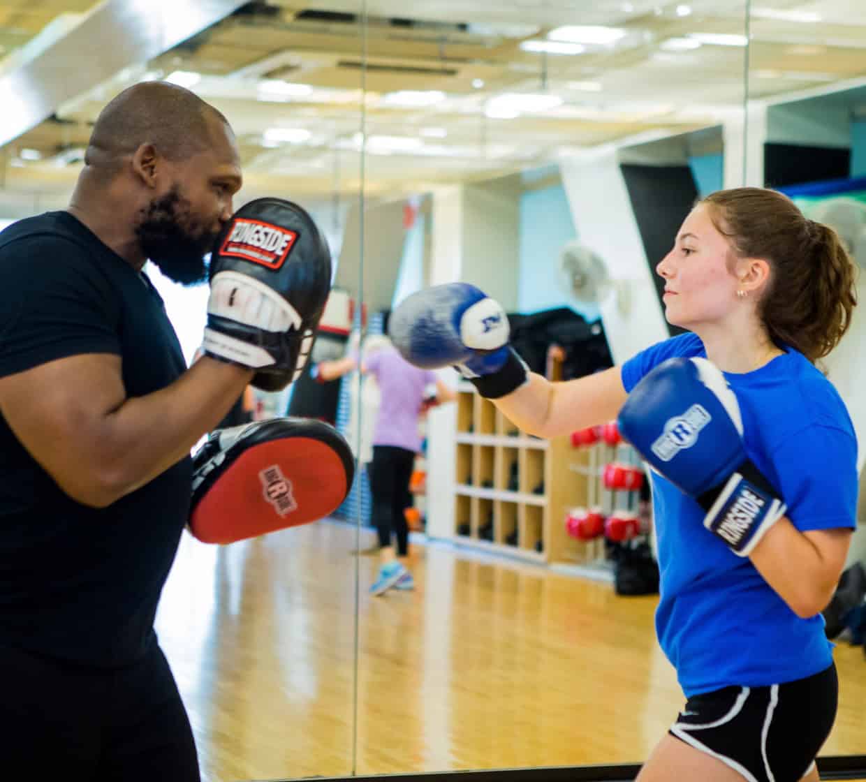 man and woman boxing
